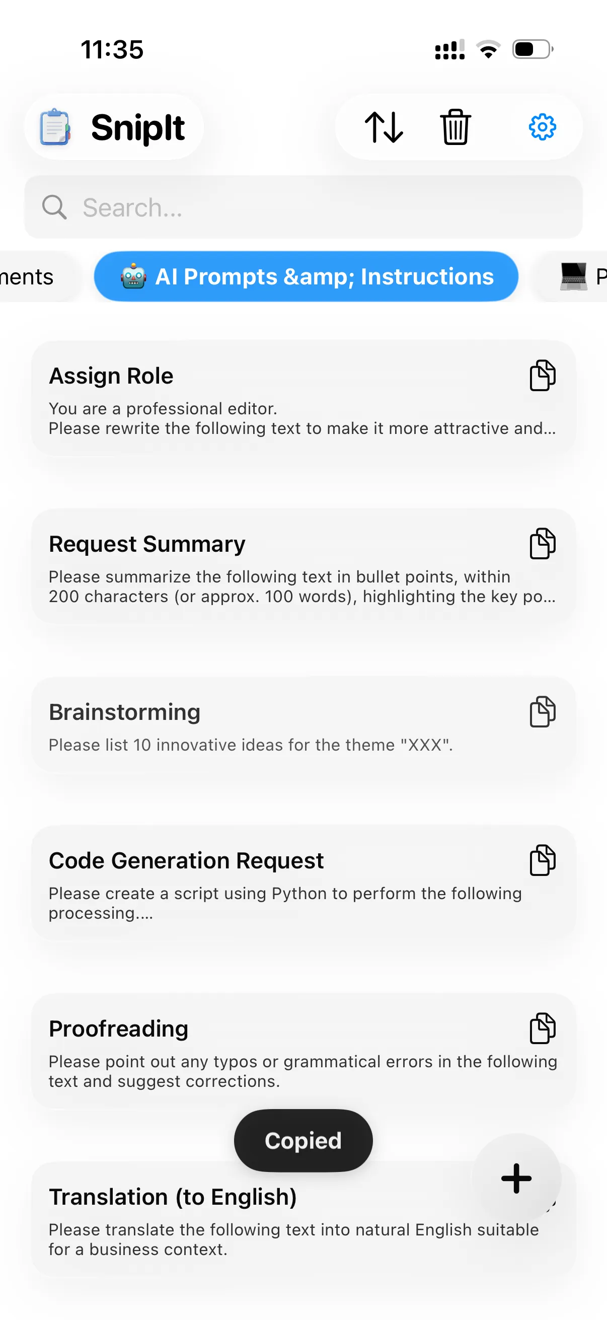 SnipIt iPhone screen showing saved text snippets inside folders
